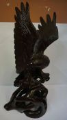 Large Carved Figure of an Eagle, raised on a naturalistic stump, 101cm high