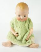 German Porcelain Doll by Armand Marseille, circa early 20th century, stamped A.M Germany with no 551