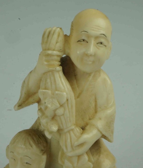 Japanese Ivory Figure Group, Meiji period, pre 1947, Modelled as a buddha with child, raised on a - Image 2 of 7