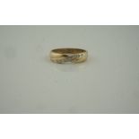 Gold and Diamond Ring, set with diamond chips, unmarked, overall weight 2.5 grams, ring size Q