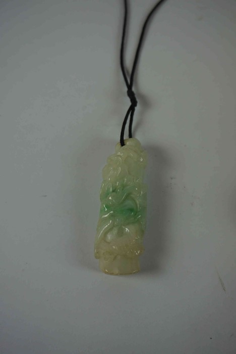 Chinese Carved Jade Pendant, Modelled as a dragon, 5cm high, also with two similar disc pendants, - Image 3 of 5