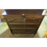 Mahogany Glazed Bookcase, Having two small drawers above sliding glazed doors, Enclosing a shelved