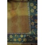 Chinese Style Carpet, Decorated with Floral medallions on an orange ground, 329cm x 240cm
