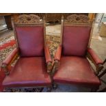 Pair of Late Victorian Carved Oak Parlour Armchairs, Upholstered in later red Rexine, Raised on