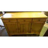 Modern Pine Dresser Base, Having three drawers above three doors, 83cm high, 133cm wide, 44cm deep