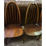 Set of Eight Ercol Comb Back Chairs, Including two Armchairs, 97cm high, (8)
