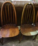 Set of Eight Ercol Comb Back Chairs, Including two Armchairs, 97cm high, (8)