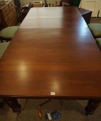 Mahogany Extending Dining Table, circa early 20th century, Having two spare leaves, Raised on
