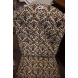 Mahogany Nursing Chair, circa late 19th century, Upholstered in later Fabric, Raised on Mahogany