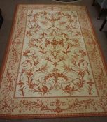 Persian Style Rug, Decorated with allover Floral swags on a cream ground, 234cm x 160cm