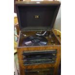 Vintage H.M.V Walnut Gramaphone, 112cm high, 49cm wide, 42cm deep, With a quantity of 7 inch Vinyl