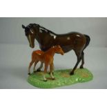 Beswick Figure Group of a Horse and Foal, Marked to underside, 18cm high, 22cm wideCondition