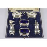 Silver Six Piece Condiment Set, Hallmarks for Walker & Hall Birmingham, Two with blue glass