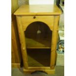 Modern Pine Cabinet, Having a glazed door enclosing a shelved interior, 101cm high, 54cm wide,