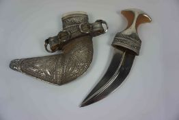 Middle Eastern Khukri Style Dagger, Blade 14.5cm long, With a white Metal scabbard Condition