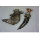 Middle Eastern Khukri Style Dagger, Blade 14.5cm long, With a white Metal scabbard Condition
