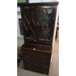 Mahogany Bookcase on Chest, circa early 20th century, Having two glazed Astragal doors enclosing a