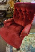 Button Back Armchair, circa late 19th century, Upholstered in later Red Dralon, Raised on Mahogany