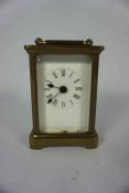 Brass Carriage Clock, Having a white enamel dial, 11cm high, Engraved to top of Clock, No key