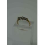 Diamond Five Stone Ring, Set with five small graduated stones, The largest stone is approximately