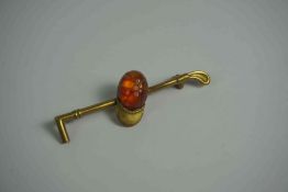 9ct Gold Brooch, Modelled as a Jockeys Cap, Having an Amber coloured Cabochon to the Cap, Unmarked