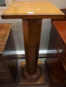 Walnut Column Stand, Having a plinth top above an Octagonal column, Raised on a plinth base, 117cm