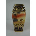 Noritake Vase, Having a Pictoral panel of a Dessert scene, Decorated with Gilded panels on a Blue