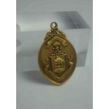 15ct Gold Bowling Medal, To the obverse having the St Mungo coat of arms for Glasgow, to the reverse