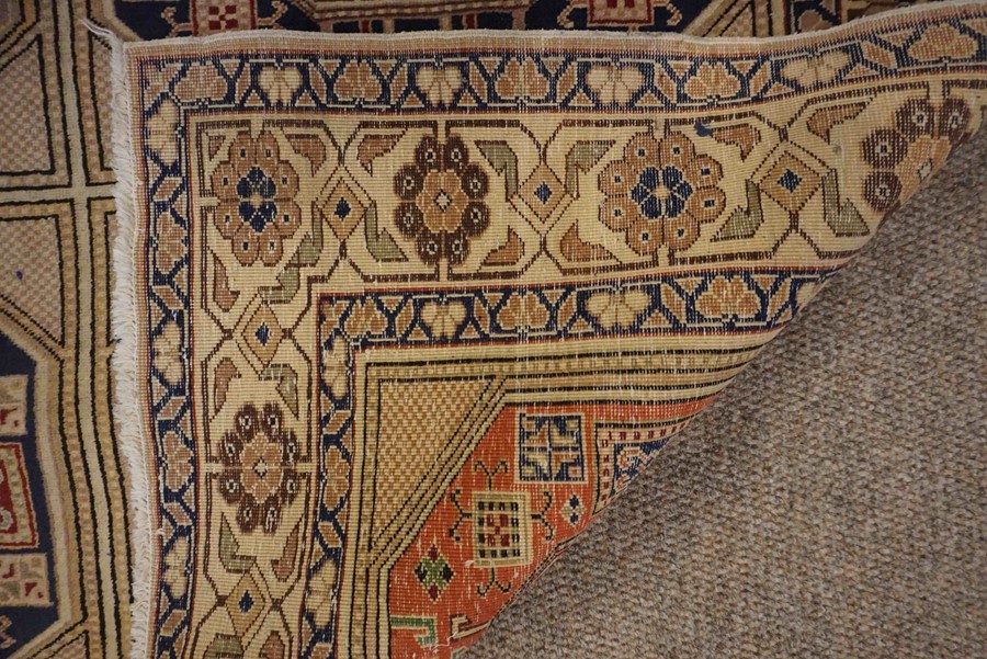 Turkish Herekeh Rug, Decorated with six rows of three Geometric Medallions on a Beige ground, - Image 3 of 7
