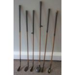 Six Vintage Hickory Shafted Golf Clubs, Makers names worn, To include a 2 Iron, Wooden Headed