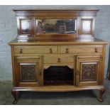 Mahogany Mirror Back Sideboard, Having a Mirrored pediment above Drawers and Doors, Raised on