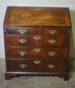 George III Mahogany Writing Bureau, Having a Fall front above two small Drawers, Enclosing fitted