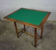 Oak Fold Over Card Table, Having a Swivel top enclosing a Green felt Interior, With a Drawer to