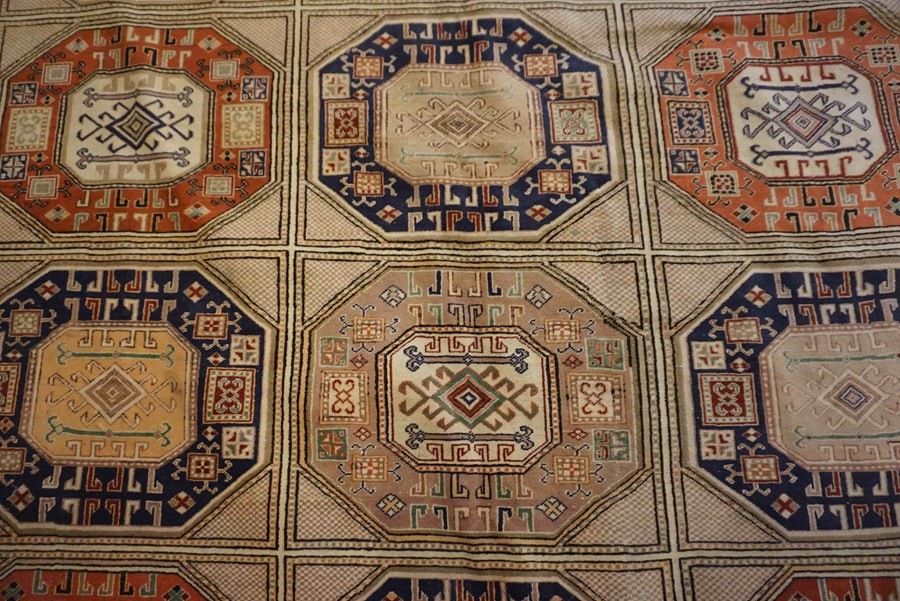 Turkish Herekeh Rug, Decorated with six rows of three Geometric Medallions on a Beige ground, - Image 2 of 7