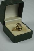 9ct Gold and Citrine Ring, The Citrine stone measuring approximately 1.5cm diameter, Stamped 375,