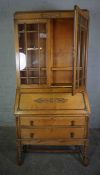 Vintage Oak Bureau Bookcase, Having two Glazed Doors enclosing a Shelved interior, Above a Fall