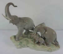 Lladro Porcelain Elephant Figure Group, Modelled as a Family of Elephants, Raised on a