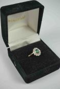 9ct Gold and Gem Set Cluster Ring, Set with a small green Gemstone to the centre, Flanked with small