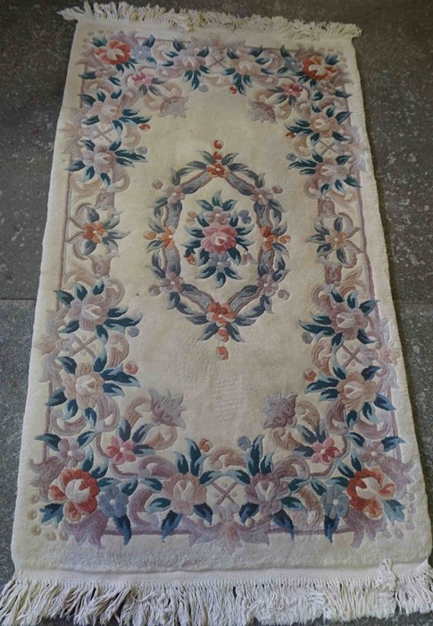 Chinese Style Rug, Decorated with Floral Motifs on a Cream ground, 180cm x 94cm