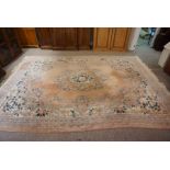 Chinese Style Carpet, Decorated with Floral Medallions on a Pink ground, 369cm x 280cm