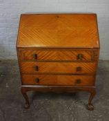 Vintage Writing Bureau, Having a Fall Front above three Drawers, Raised on Ball and Claw supports,