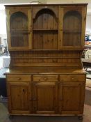 Pine Dresser, Having two Glazed Doors above three Drawers and three Doors, 189cm high, 133cm wide,