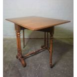 Victorian Walnut Drop Leaf Table, Raised on Turned Supports with Brass Castors, 70cm high, 96cm