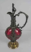 Renaissance Style Pewter and Cranberry Glass Claret Jug, The Stopper is modelled as a Putti