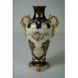 Coalport Porcelain Vase, circa early 20th century, Having panels of Roses on a blue Cobalt ground,