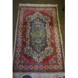 Persian Rug, Decorated with Geometric Motifs on a Pink ground, 158cm x 90cm