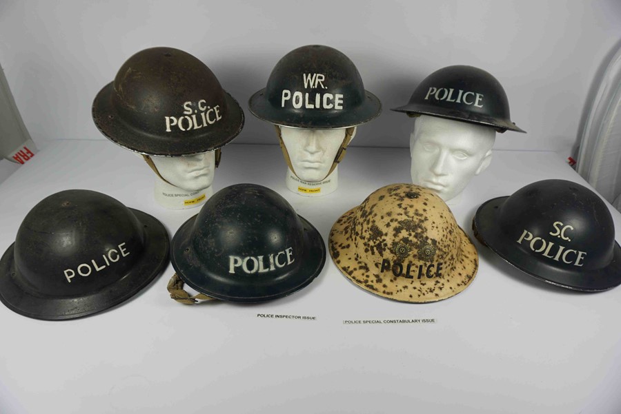 Collection of WWII and Later Steel Police Helmets, To include an Inspector Issue Helmet, Home