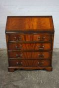Reproduction Writing Bureau, Having a Fall Front above pull out Slides and four Graduated Drawers,