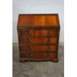 Reproduction Writing Bureau, Having a Fall Front above pull out Slides and four Graduated Drawers,