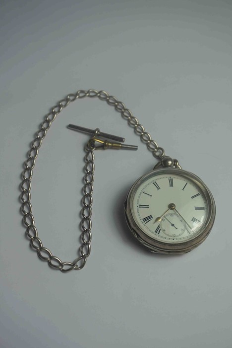 Victorian Silver Cased Pocket Watch, Having a white Enamel dial with Subsidiary seconds dial, With a